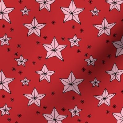 Origami Christmas stars - Star shaped ornaments and snowflakes pink on red