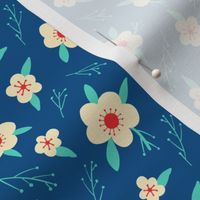 Simple white flowers on blue background