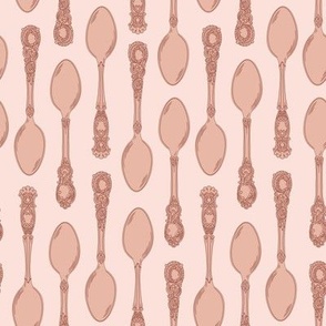 Small Two Direction Vintage Teaspoons with Pale Pink Background