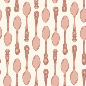 Small Two Direction Vintage Teaspoons with Seashell White Background