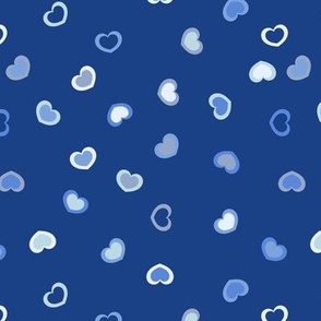 Dark to light blue ombre hearts on a navy blue background