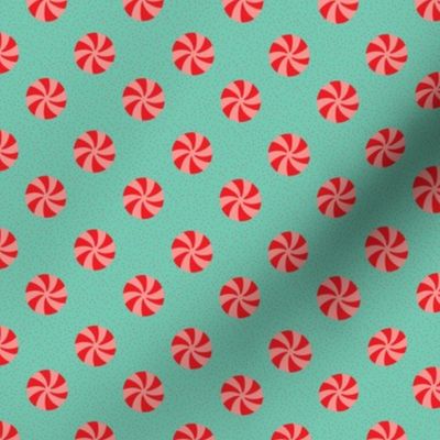 Red and pink peppermints on teal on red dots