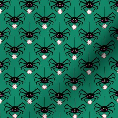 spiders with peppermint on green