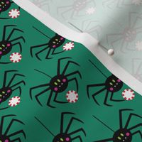 spiders with peppermint on green