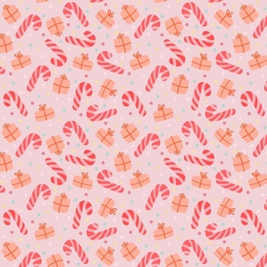 Christmas Red candy cane and gifts on pastel pink