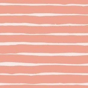 Peach stripes on light blush