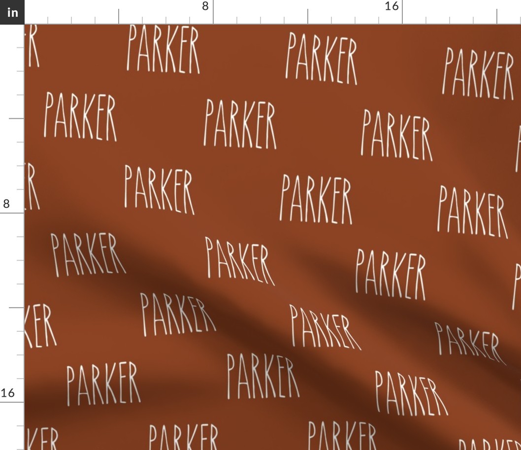 custom name - white font on rust background - Parker