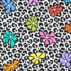 groovy funky retro vintage rainbow psychedelic flowers over black and white leopard animal skin texture