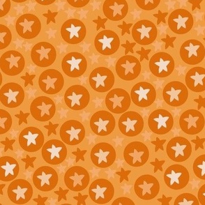 Tanning tangerine circles and dots with marigold background