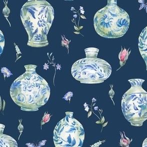 Blue porcelain vase with flowers on dark blue