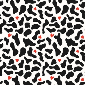 Cute black and white cow print with red hearts