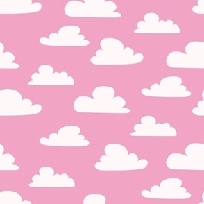 Cartoon white clouds on pink sky