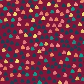 Gum drops with claret background