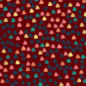 Gum drops with rosewood background