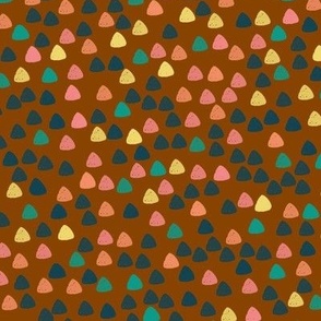 Gum drops with brown background