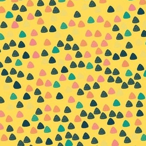 Gum drops with mustard background