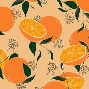 oranges and green leaves on light salmon