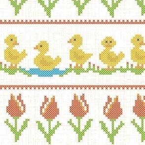 Cute ducklings in cross stitch