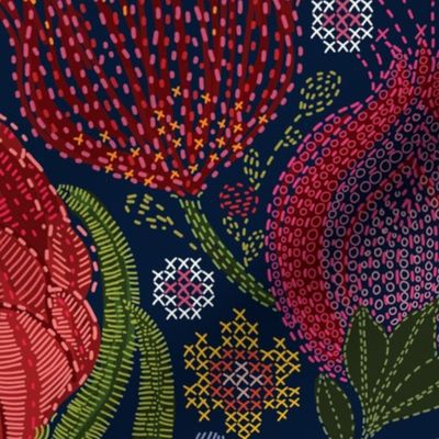 Protea Cross Stitch with Embroidery accents on navy blue