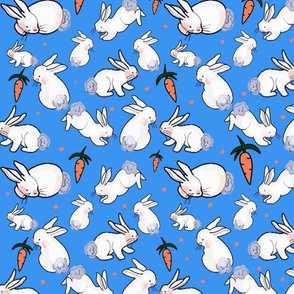 Bunnies and carrots on blue with orange dots
