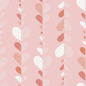 Stacked Valentine Hearts in white and shades of pink on light pink