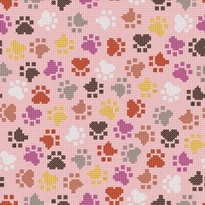 Small scale // Pawsome cross stitch // cotton candy pink background yellow brown berry and peony pink paw prints