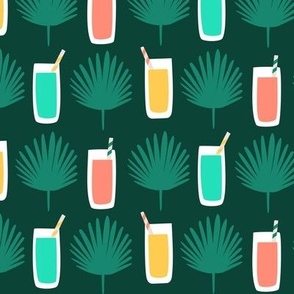 Tropical drinks with palm leaves