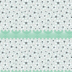 Floral: white and mint green flowers on a gray backgrond