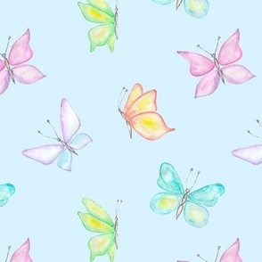 Pastel Rainbow Watercolor Butterflies on Blue