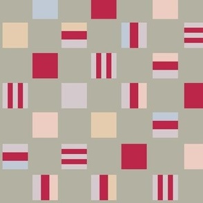 Liquorice allsorts - one-inch  squares in cherry and spice on grey