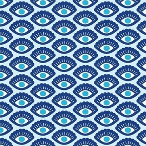 Retro style evil eyes - greek traditional spiritual protection symbol in traditional blue on baby blue