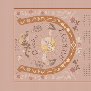 lucky rabbit "faux" cross stitch 2023 calendar tea towel in Dusty Rose Pink, Deep Gold