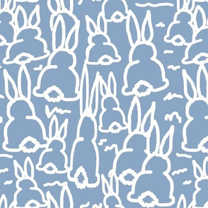 White bunny bottoms on blue