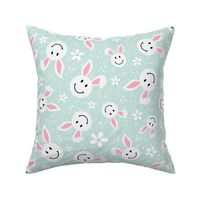 Large Scale White Easter Bunny Smile Faces on Soft Mint