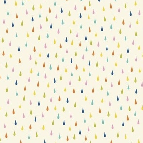 Colorful raindrops on cream background
