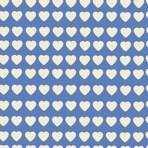 Cream hearts. on blue