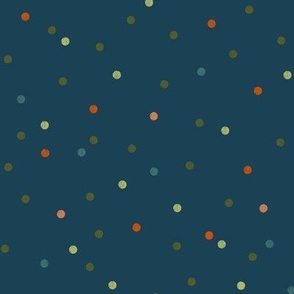 Red and green confetti on navy blue