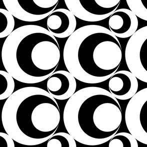 Black and White Swirls and Circles On a Black Background