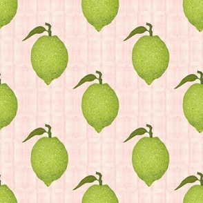 Limes on a Soft Pink Colored Textured Background