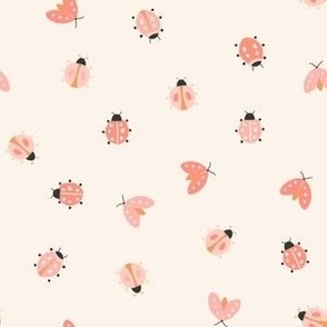 small cute pink beetle winged insect ladybug summer june bugs on beige