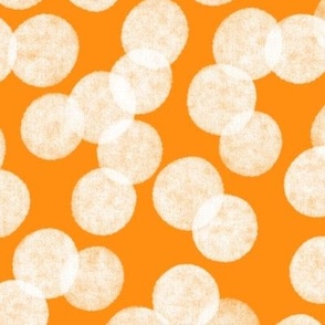 Paper confetti on orange