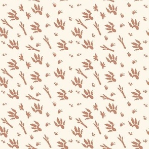 Small Distressed Dinosaur Footprints in Mocha Brown with a Cream White Background