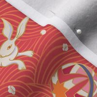 Playful Japanese Rabbits on radiant red