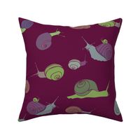 large - snails in rainbow on wine red
