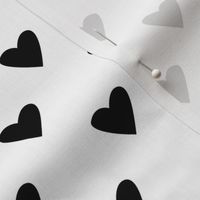small - black hearts on white