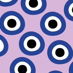 Minimalist retro evil eye - irregular large circles and dots arabic abstract symbol on lilac purple