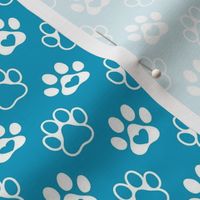Smaller Scale Paw Prints White on Caribbean Blue