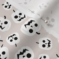 Spooky carved halloween pumpkins - cutesy style retro fall design white on sand
