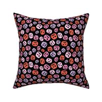 Spooky carved halloween pumpkins - cutesy style boho retro fall design orange lilac blush on black night