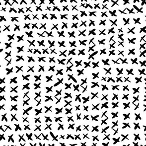 Abstract black x brush strokes or crosses